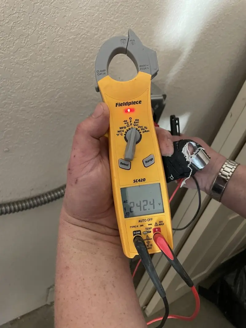 Voltage testing with clamp meter during Generator Installation in Lamesa